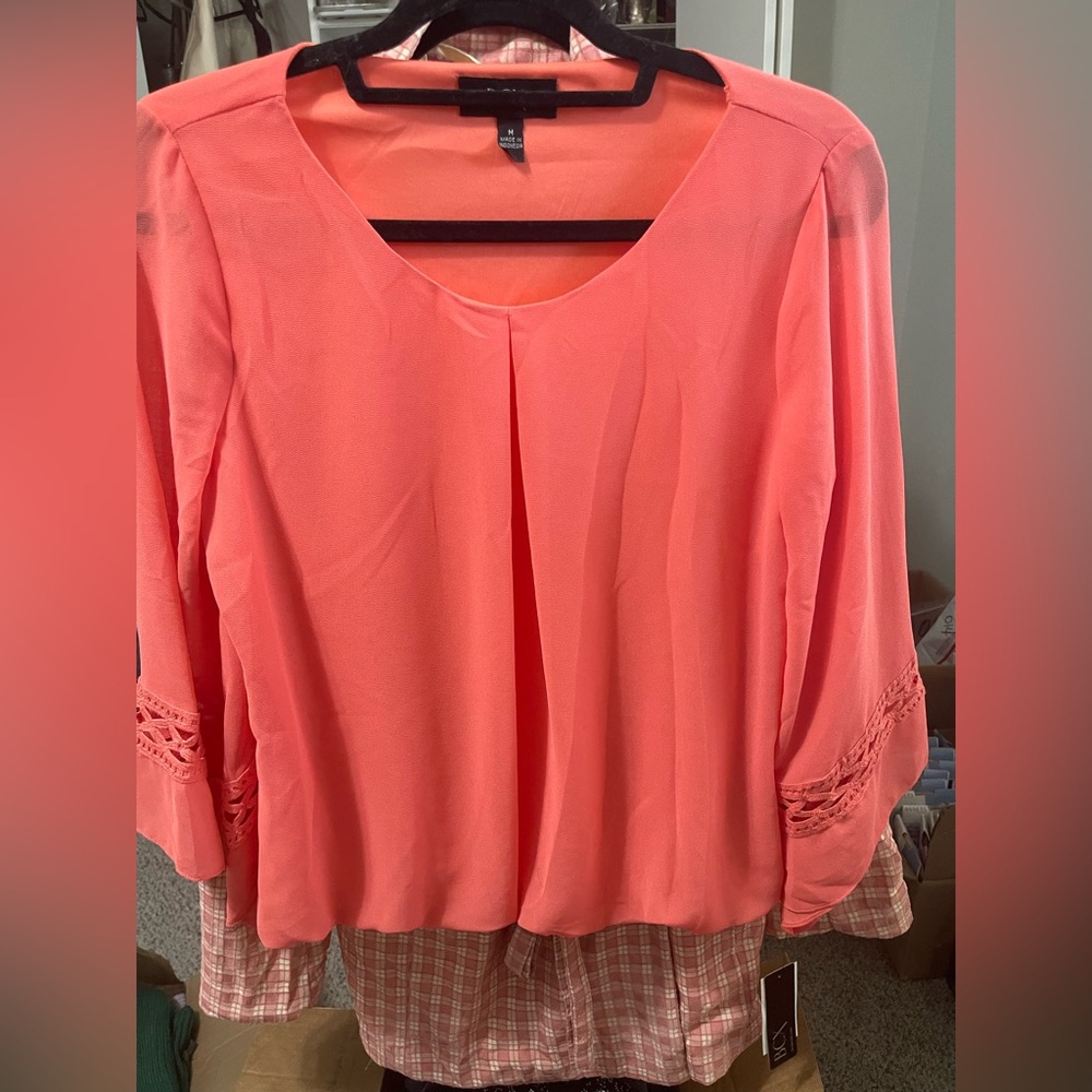 BCX Vibrant Coral Blouse with Lace Accents lined body sleeves are sheer